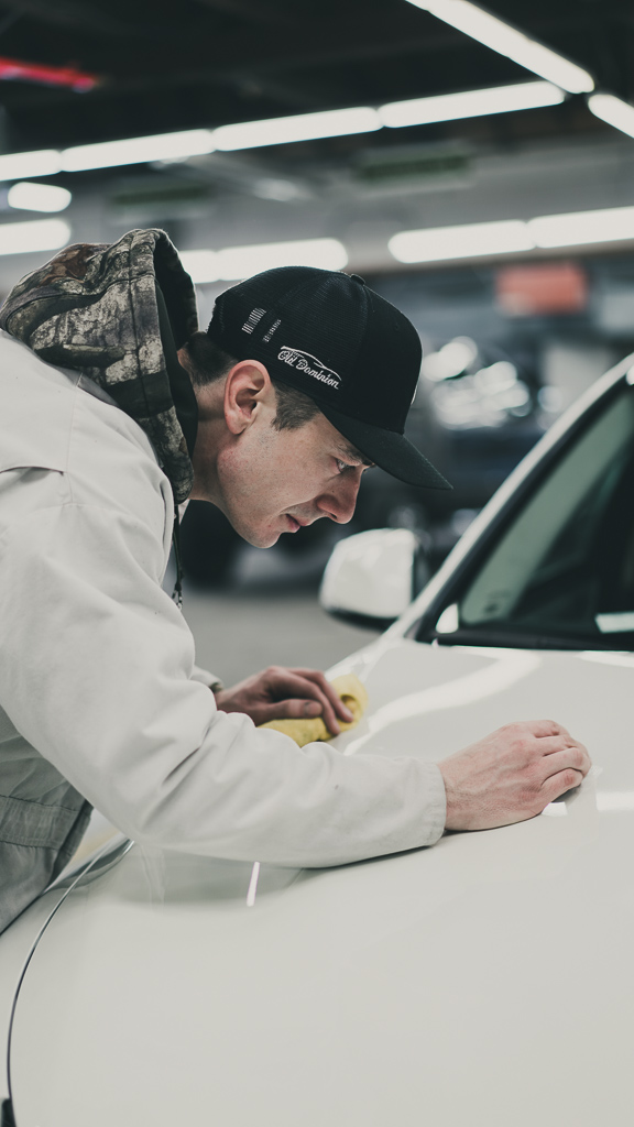 man doing auto body repairs