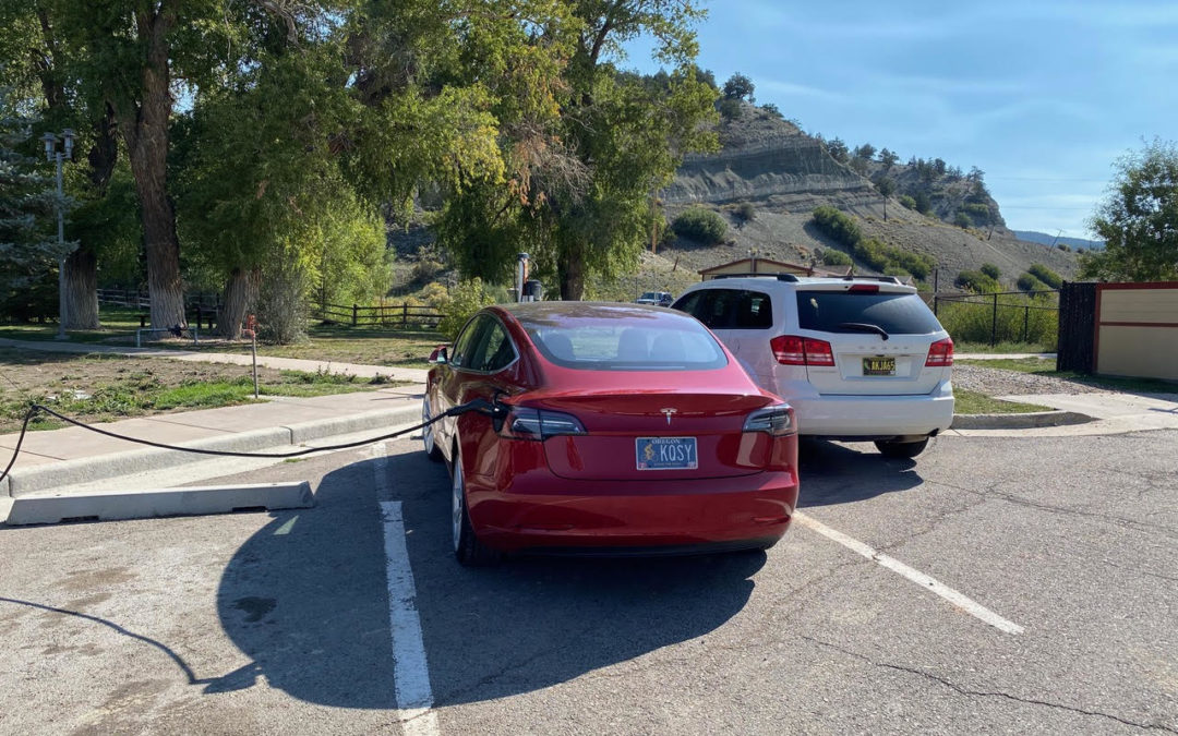 charging Tesla at a rest stop